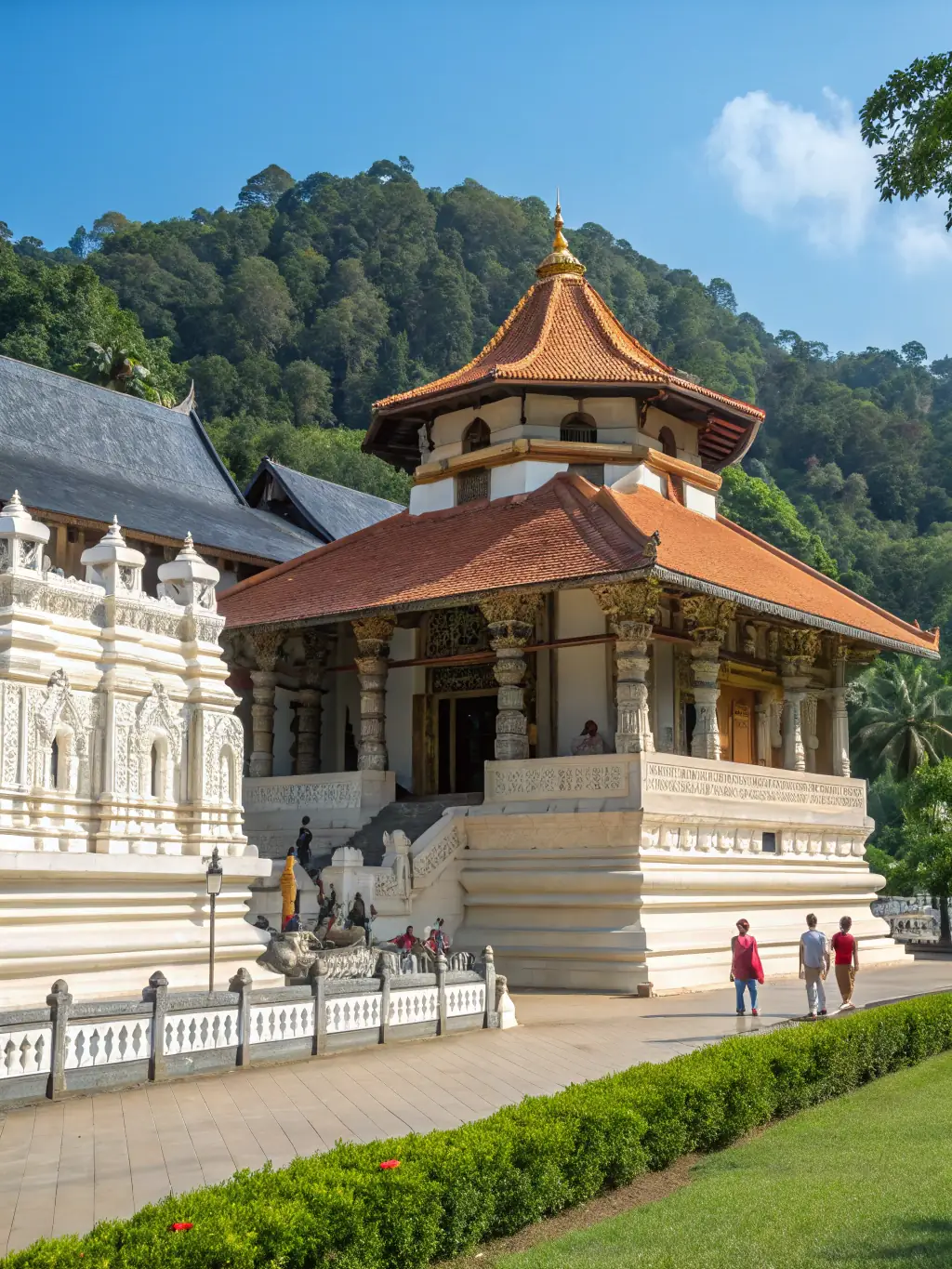 A vibrant photograph of Kandy, Sri Lanka, featuring the Temple of the Tooth Relic and the surrounding cityscape. The image should capture the cultural richness and spiritual significance of the location.